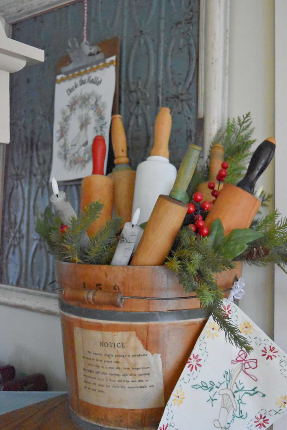 Vintage Farmhouse Bucket Filled with Rolling Pins and Greenery Vintage Farmhouse Bucket Filled with Rolling Pins and Greenery — Christmas Kitchen Decor