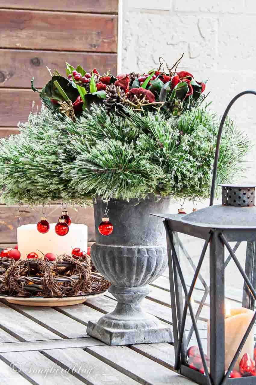 Rustic Outdoor Table Centerpiece with Urn, Wreath, and Lantern Rustic Outdoor Table Centerpiece with Urn, Wreath, and Lantern — Christmas Yard Decor