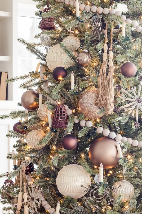 Close-up of Metallic and Textured Ornaments on a Neutral Tree — Neutral Christmas Tree