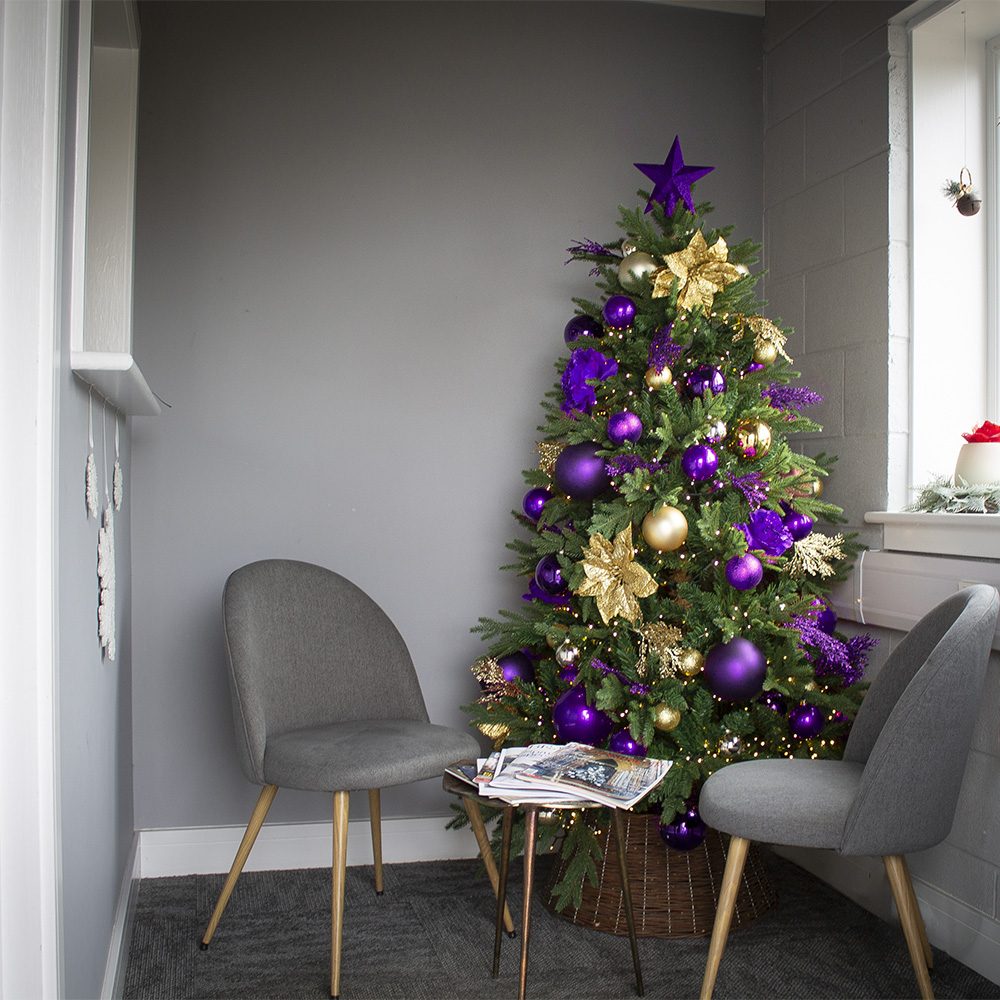 Modern Corner Tree with Vibrant Purple and Gold Scheme Modern Corner Tree with Vibrant Purple and Gold Scheme — Christmas Tree Trends 2026