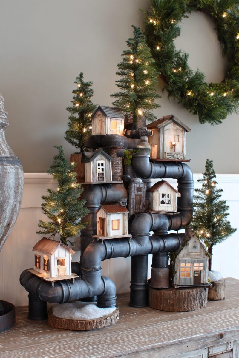 Rustic Christmas Village Display on Metal Pipe Structure Rustic Christmas Village Display on Metal Pipe Structure — Christmas Light Display Ideas