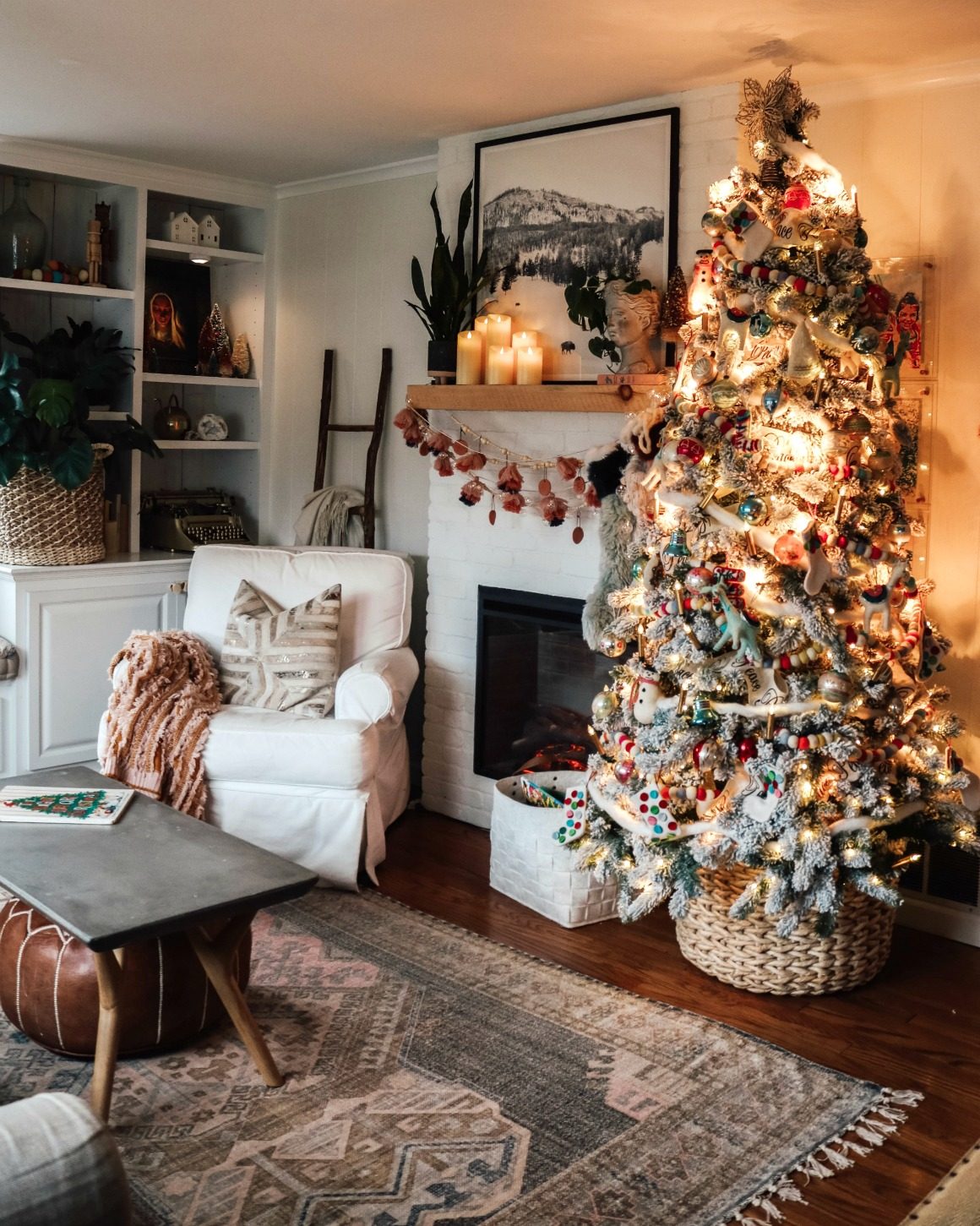 Cozy Living Room Evening Atmosphere with a Flocked Christmas Tree Focal Point — Christmas Living Room Decor
