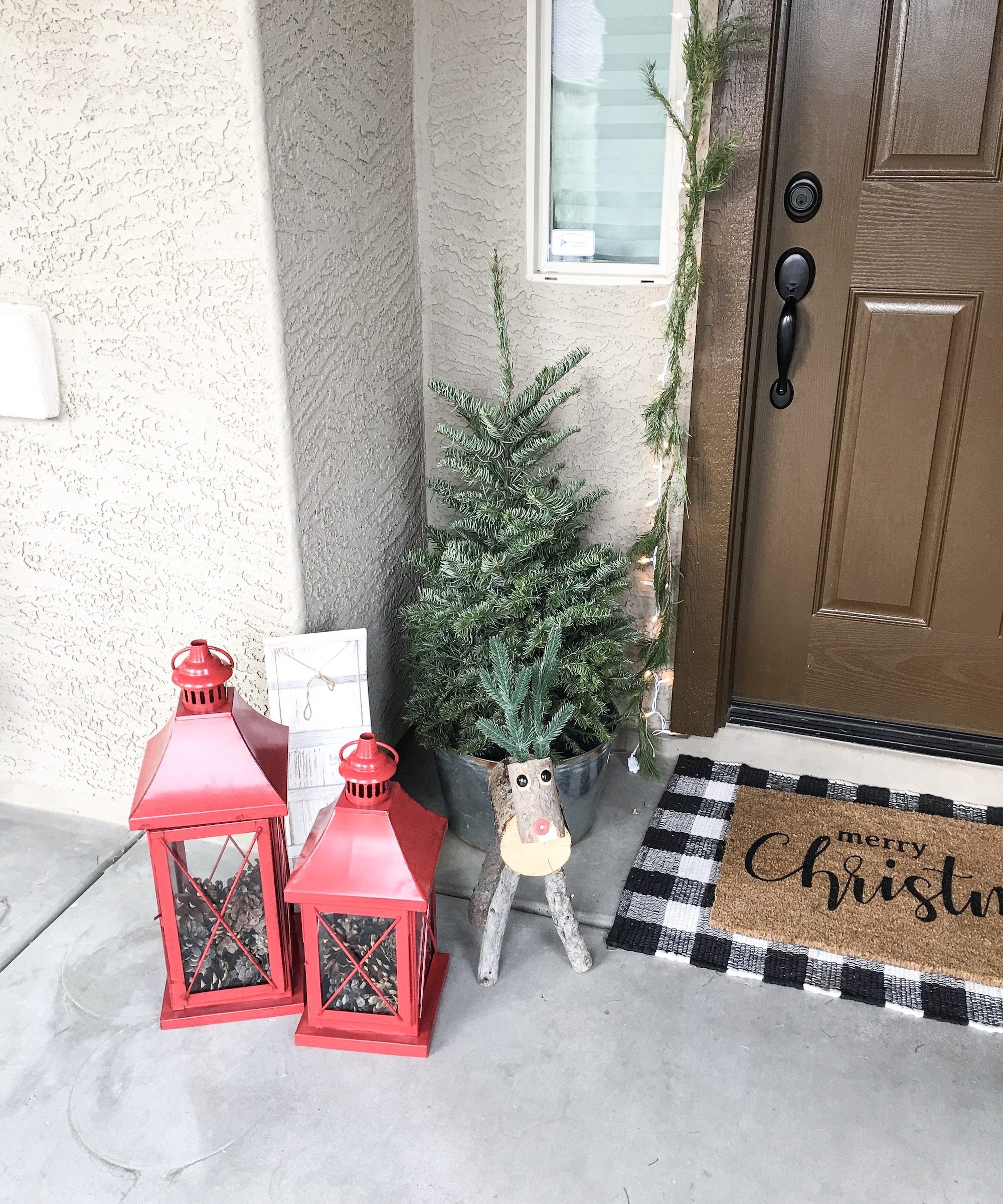 Bright Red Lanterns Flanking a Christmas Tree by the Front Door — Christmas Porch Lanterns