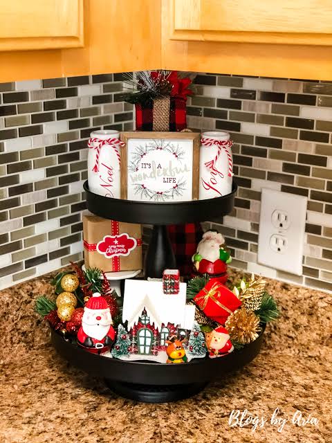 Black Tiered Tray with Santa Figures and Mini Houses — Christmas Tiered Tray