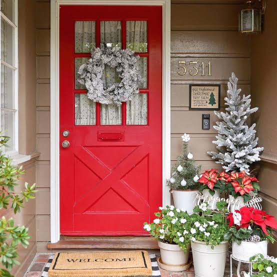 Vibrant Red Door with Frosted Wreath and Potted Poinsettias Vibrant Red Door with Frosted Wreath and Potted Poinsettias — Christmas Front Door Decor