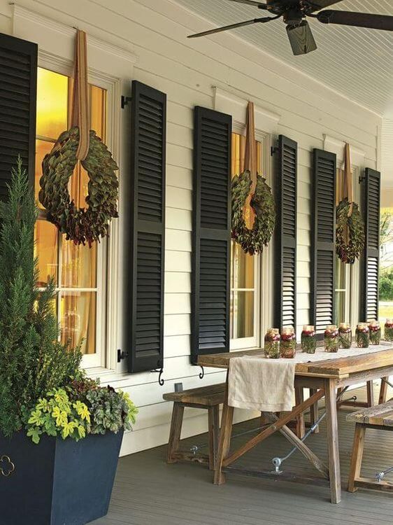 Farmhouse Porch with Rustic Wreath-Adorned Windows — Christmas Window Decor Outdoor