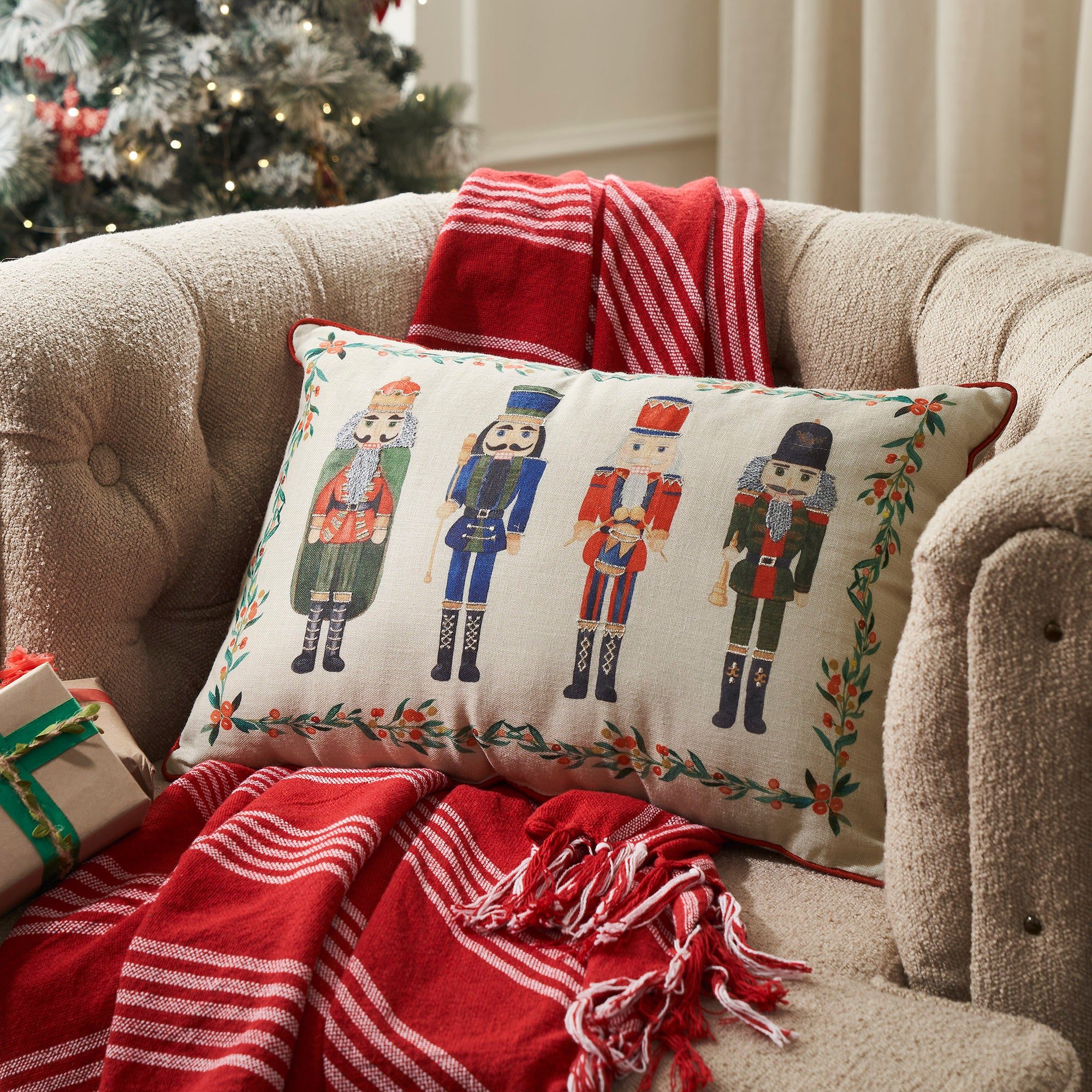 Cozy Armchair with Nutcracker Embroidered Pillow — Nutcracker Christmas Decor