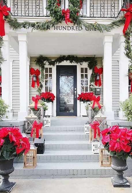 Grand Porch Steps with Red Poinsettias and String Lights — Christmas Porch Decor