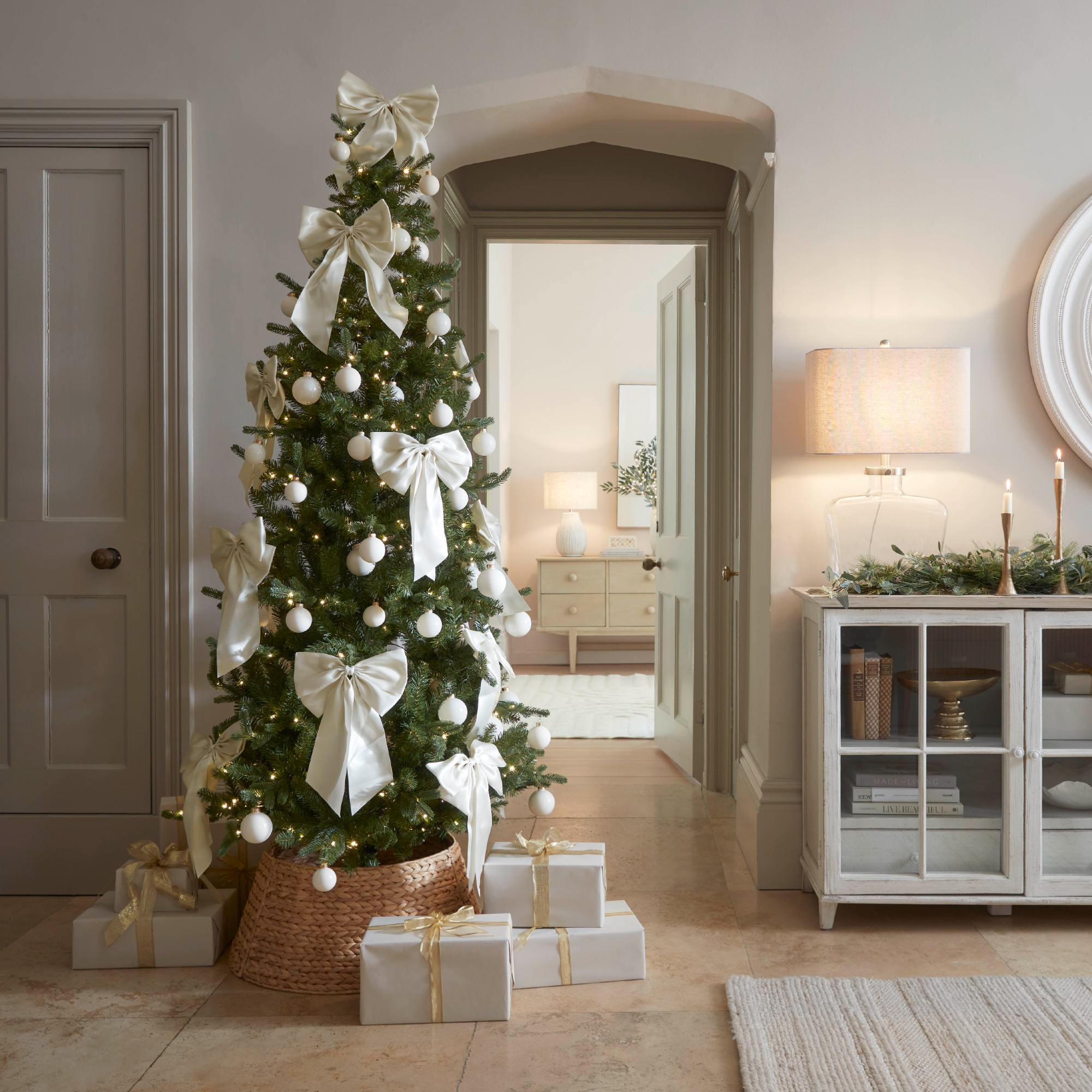 Modern Hallway Slim Tree with Large White Bows — Slim Christmas Tree Decor