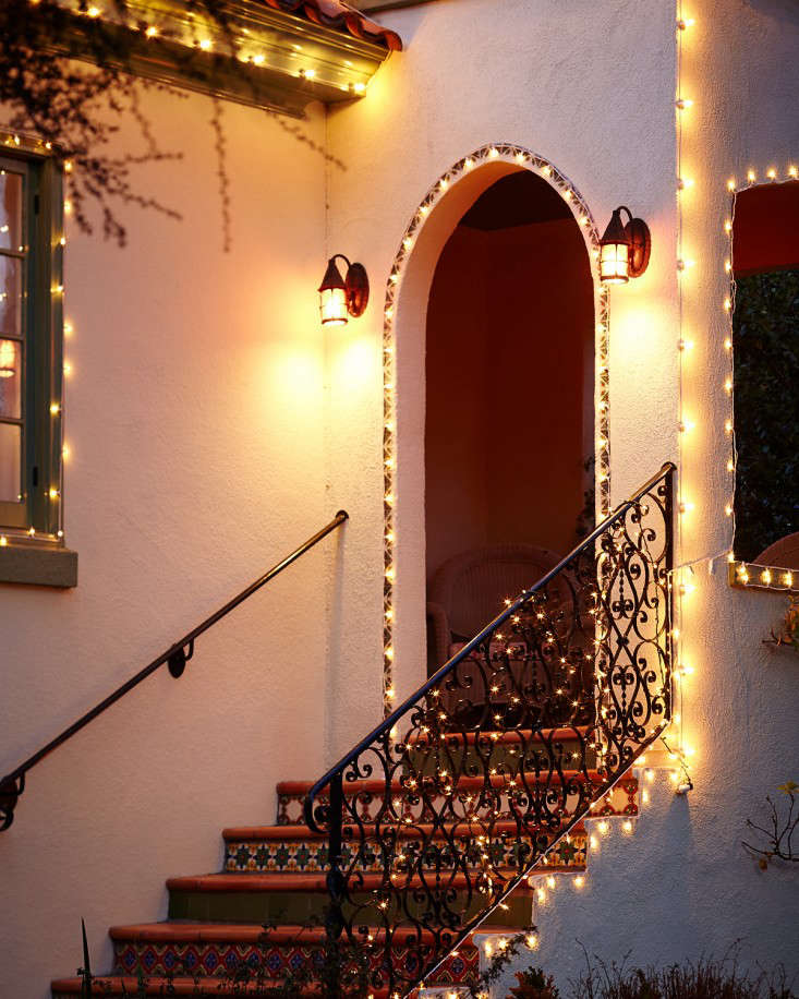 Mediterranean Porch with Golden String Lights Framing Archway Mediterranean Porch with Golden String Lights Framing Archway — Outdoor Christmas Lights