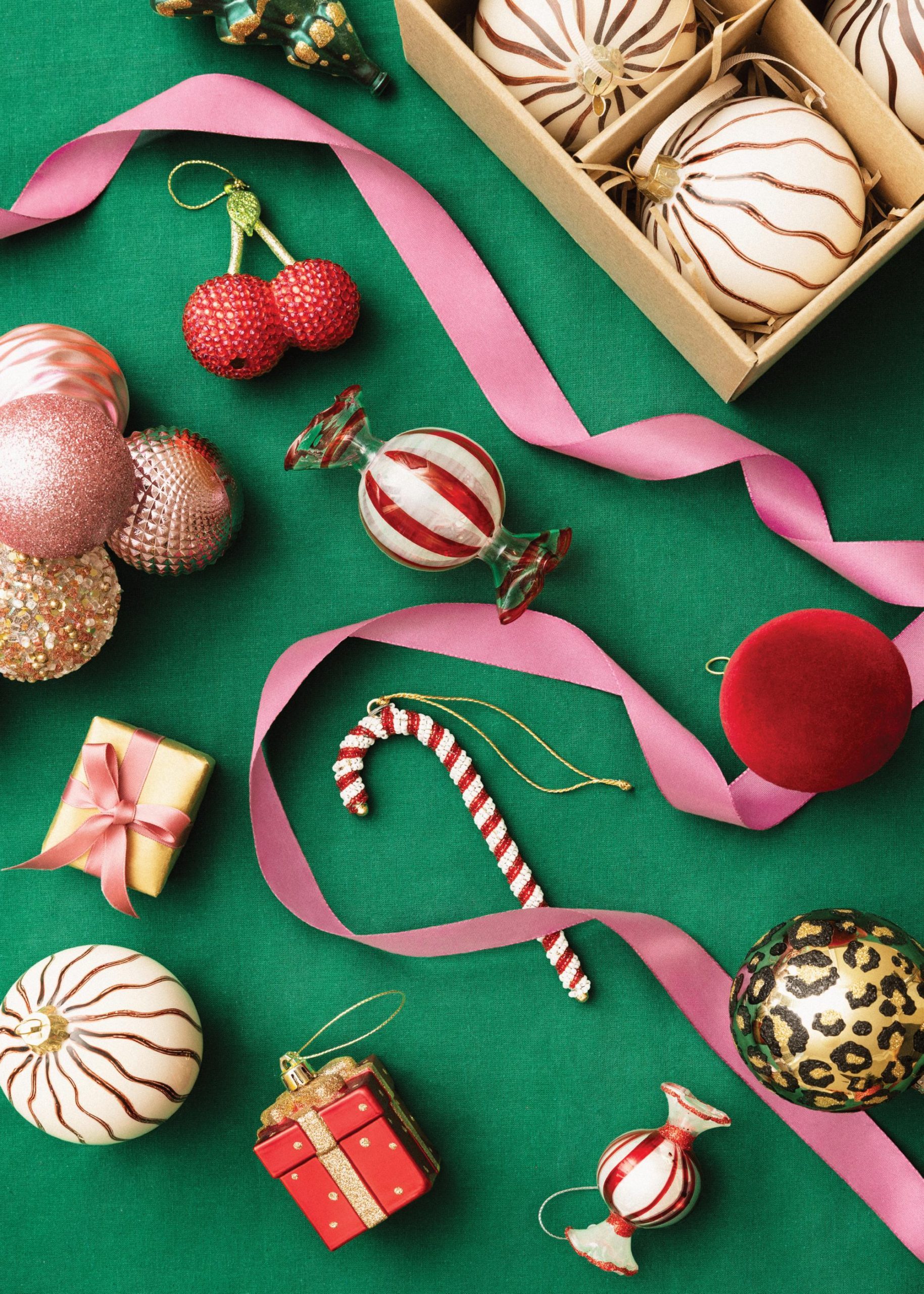 Overhead Flat Lay of Festive Red, Pink, and Gold Christmas Ornaments Overhead Flat Lay of Festive Red, Pink, and Gold Christmas Ornaments — Christmas Decor