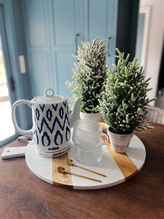 Modern Tabletop Vignette with Patterned Teapot and Frosted Trees — Winter Decor After Christmas