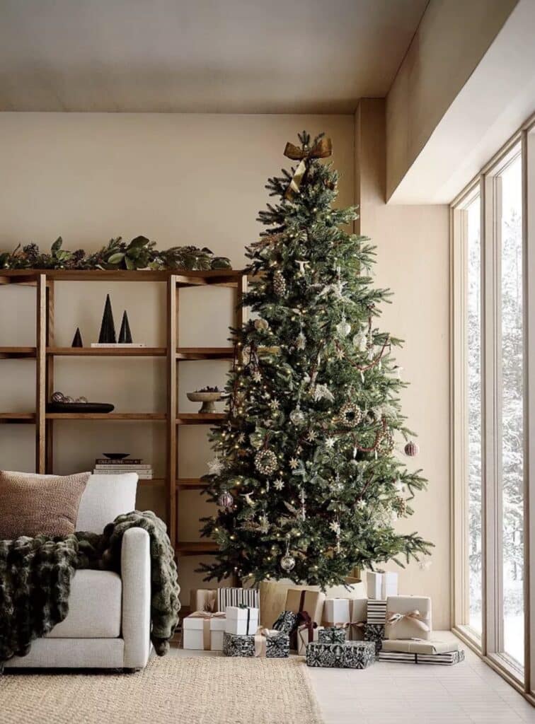 Tree Centered In Room Sofa To The Left Tall Modern Christmas Tree in a Neutral Living Room — Neutral Christmas Tree