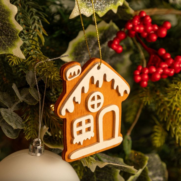 Wooden Gingerbread House Ornament on a Christmas Tree Wooden Gingerbread House Ornament on a Christmas Tree — Gingerbread Christmas Tree