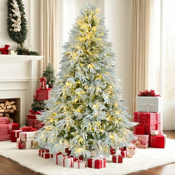 Spacious Living Room with Large Flocked Christmas Tree and Gifts — Winter Wonderland Christmas Decor