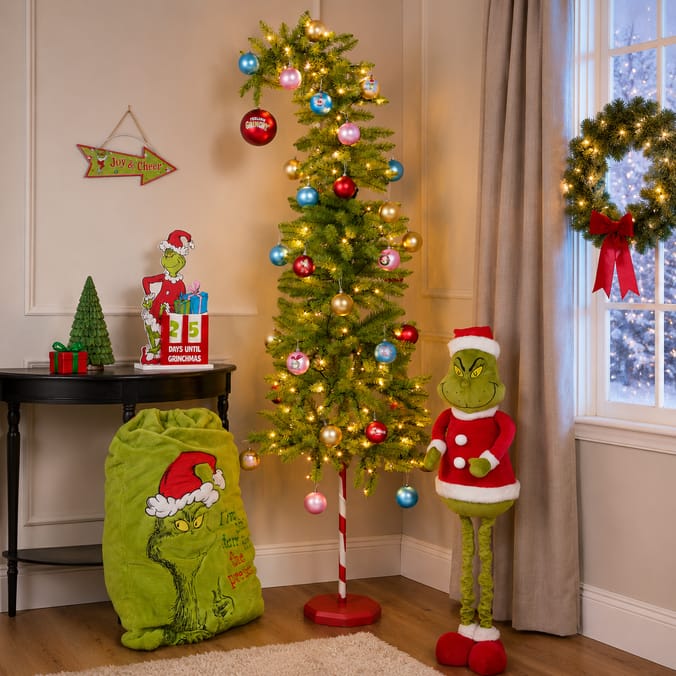 Grinch Tree Flanked by Grinch Figures Grinch Tree Flanked by Grinch Figures — Grinch Christmas Tree