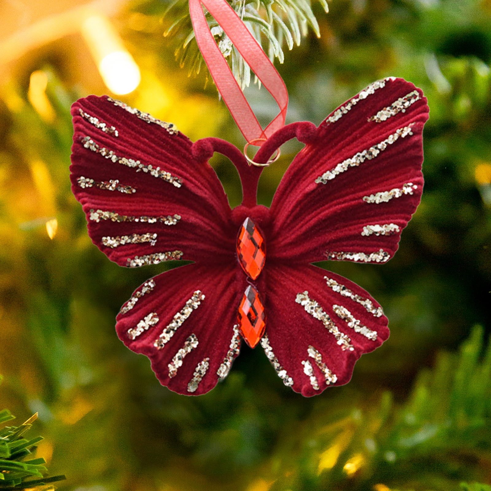 Close-Up of a Burgundy Velvet Butterfly Ornament Close-Up of a Burgundy Velvet Butterfly Ornament — Burgundy Christmas Decor