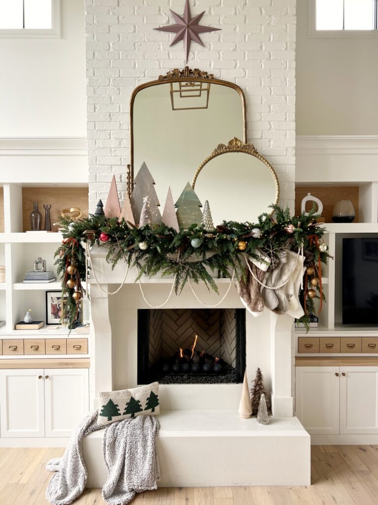 Cozy Whimsical Mantel with Layered Garland and Mirrored Accents Cozy Whimsical Mantel with Layered Garland and Mirrored Accents — Whimsical Christmas Decor