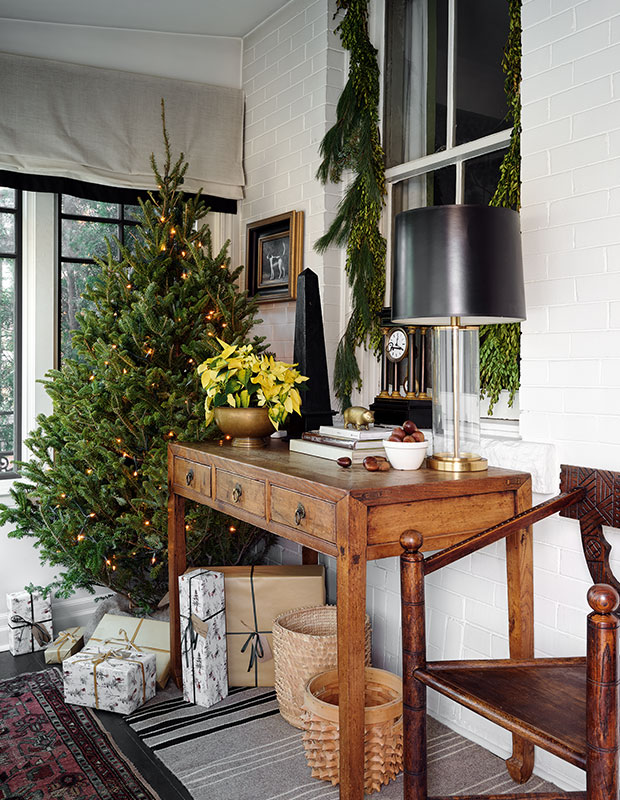 Sunroom Tree with Brass Lamp and Rustic Wooden Chair — Minimalist Christmas Tree