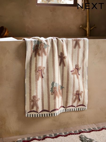 Gingerbread Man Applique Towel on Bathtub Edge — Christmas Bathroom Decor