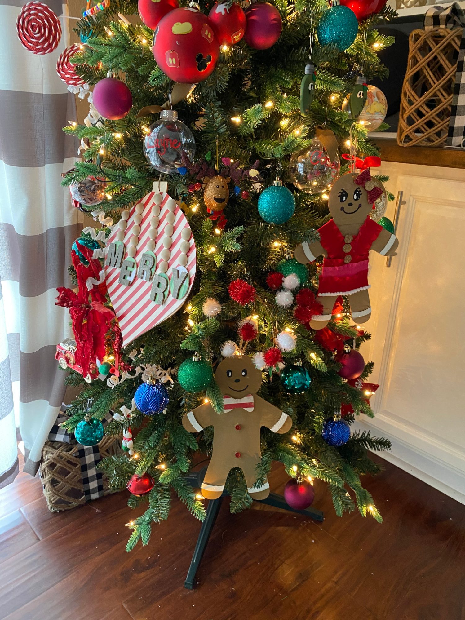 Tree Centered Decorated Traditional Living Room Christmas Tree with Gingerbread Ornaments — Dollar Tree Christmas Decor