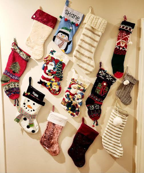 Vintage Stockings on Wooden Wall Hooks — Christmas Stockings Display