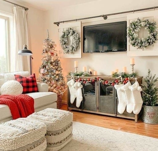 Cozy Living Room Console Table with Wreaths and Stockings — Cozy Christmas Decor