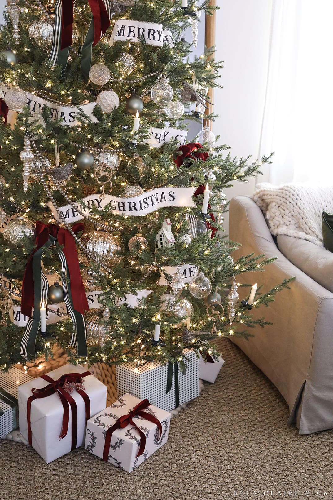 Vintage Christmas Tree with 'Merry Christmas' Banners and Gifts