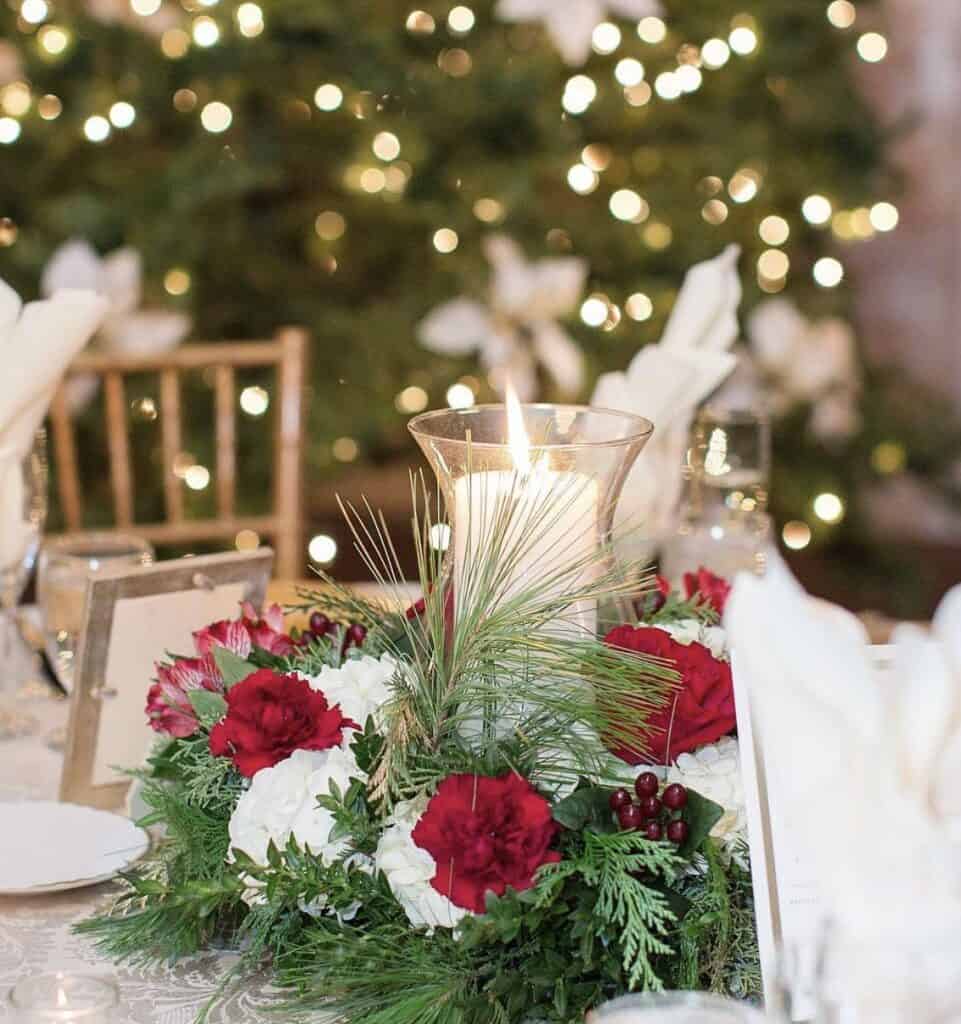 Traditional Table Centerpiece with Red and White Flowers and Candle Traditional Table Centerpiece with Red and White Flowers and Candle — Christmas Wedding Decor