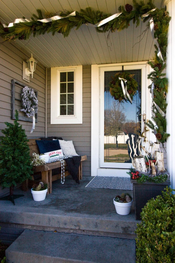 Farmhouse Bench with Garland and Wreath for a Welcoming Entry Farmhouse Bench with Garland and Wreath for a Welcoming Entry — Small Christmas Porch