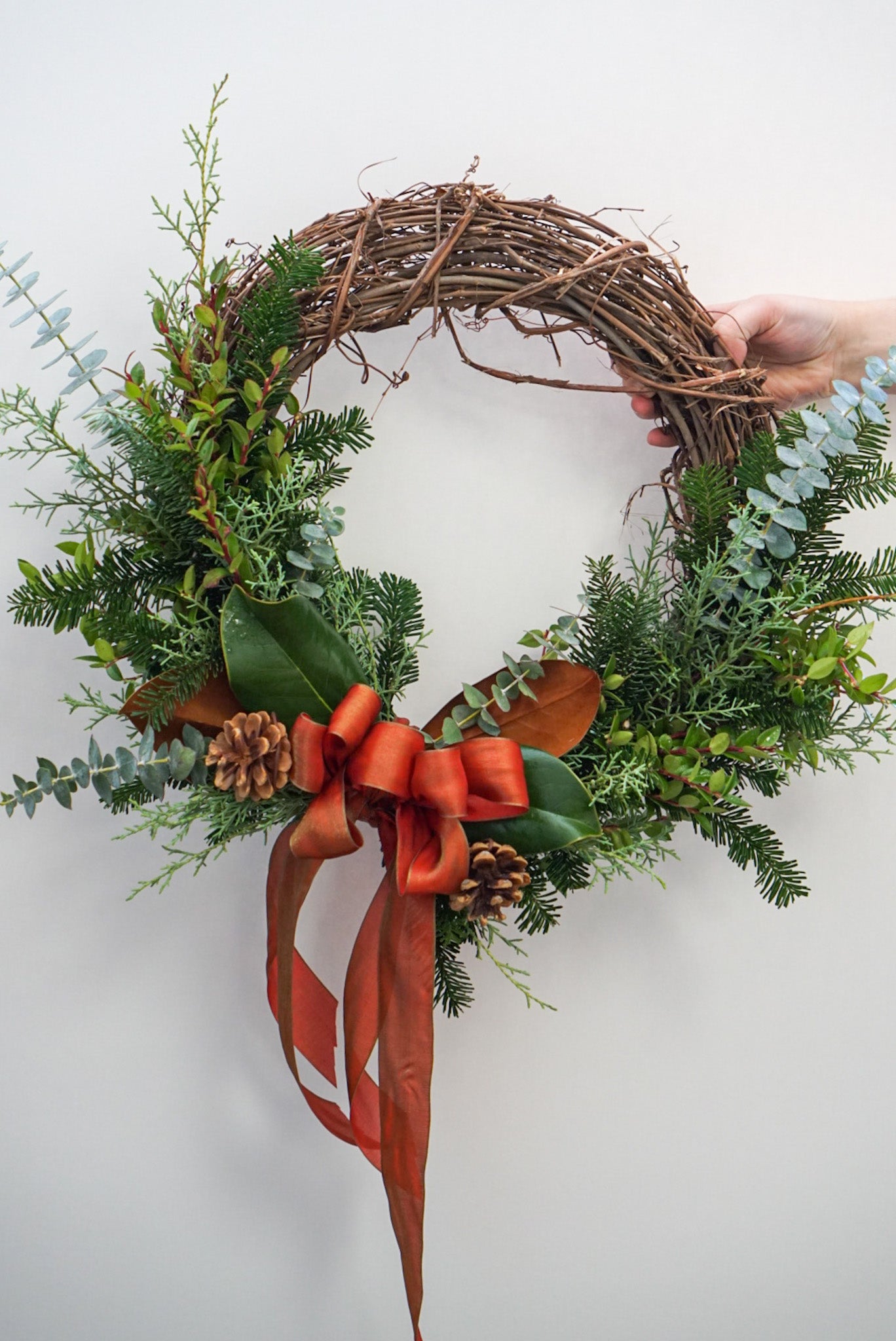 Rustic Grapevine Wreath with Burnt Orange Ribbon Rustic Grapevine Wreath with Burnt Orange Ribbon — Christmas Wreath