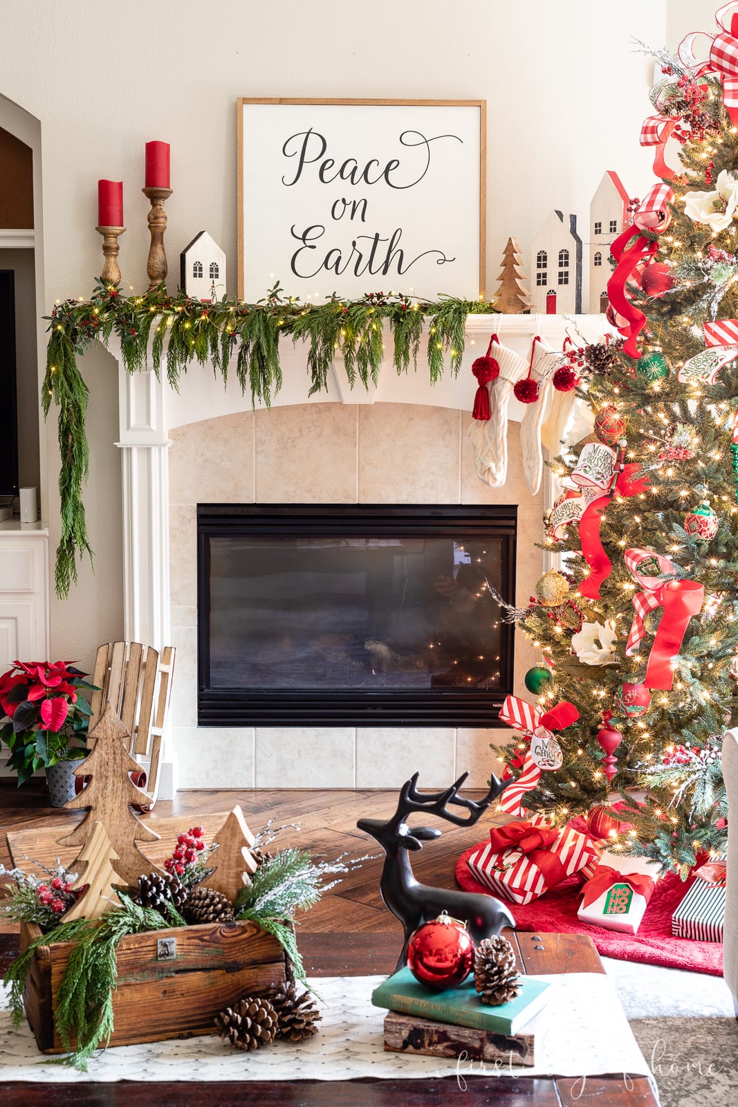 Farmhouse Fireplace Mantel with Wooden Houses and Stockings Farmhouse Fireplace Mantel with Wooden Houses and Stockings — Farmhouse Christmas Decor