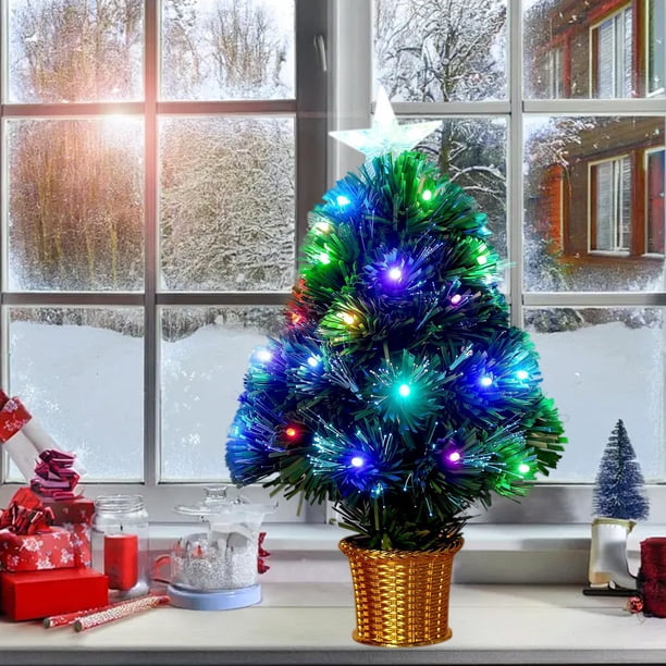 Compact Christmas Tree with Fiber Optic Lights on a Windowsill Compact Christmas Tree with Fiber Optic Lights on a Windowsill — Christmas Tree with Colored Lights