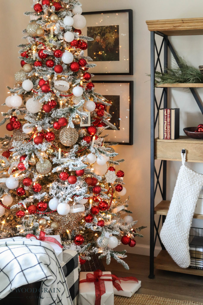 Living Room Frosted Christmas Tree with Red Ornaments and Gold Accents Living Room Frosted Christmas Tree with Red Ornaments and Gold Accents — Red and Gold Christmas Decor