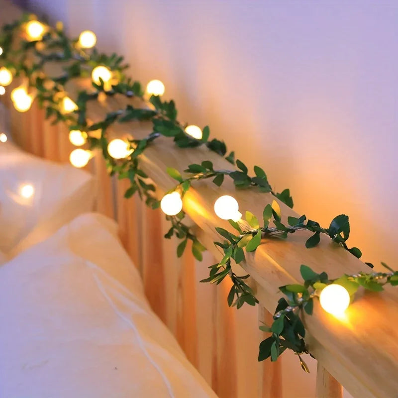 Cozy Greenery Garland with Fairy Lights on Wooden Railing Cozy Greenery Garland with Fairy Lights on Wooden Railing — Christmas Lights in Garland Indoor