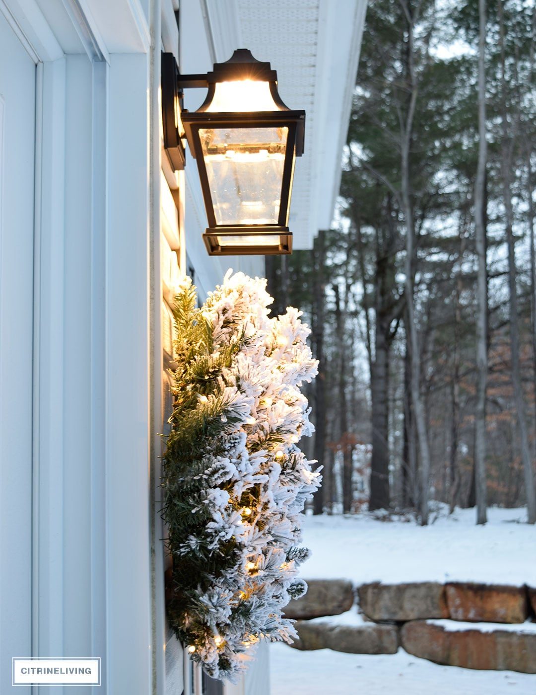 Wall-Mounted Lantern Dressed in Flocked Greenery and Fairy Lights — Christmas Porch Lanterns