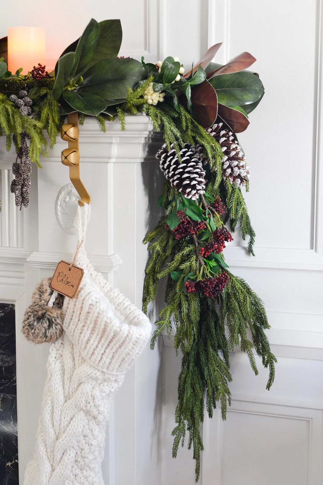 Christmas Garland and Stocking on a Fireplace Mantel Christmas Garland and Stocking on a Fireplace Mantel — Burgundy Christmas Decor