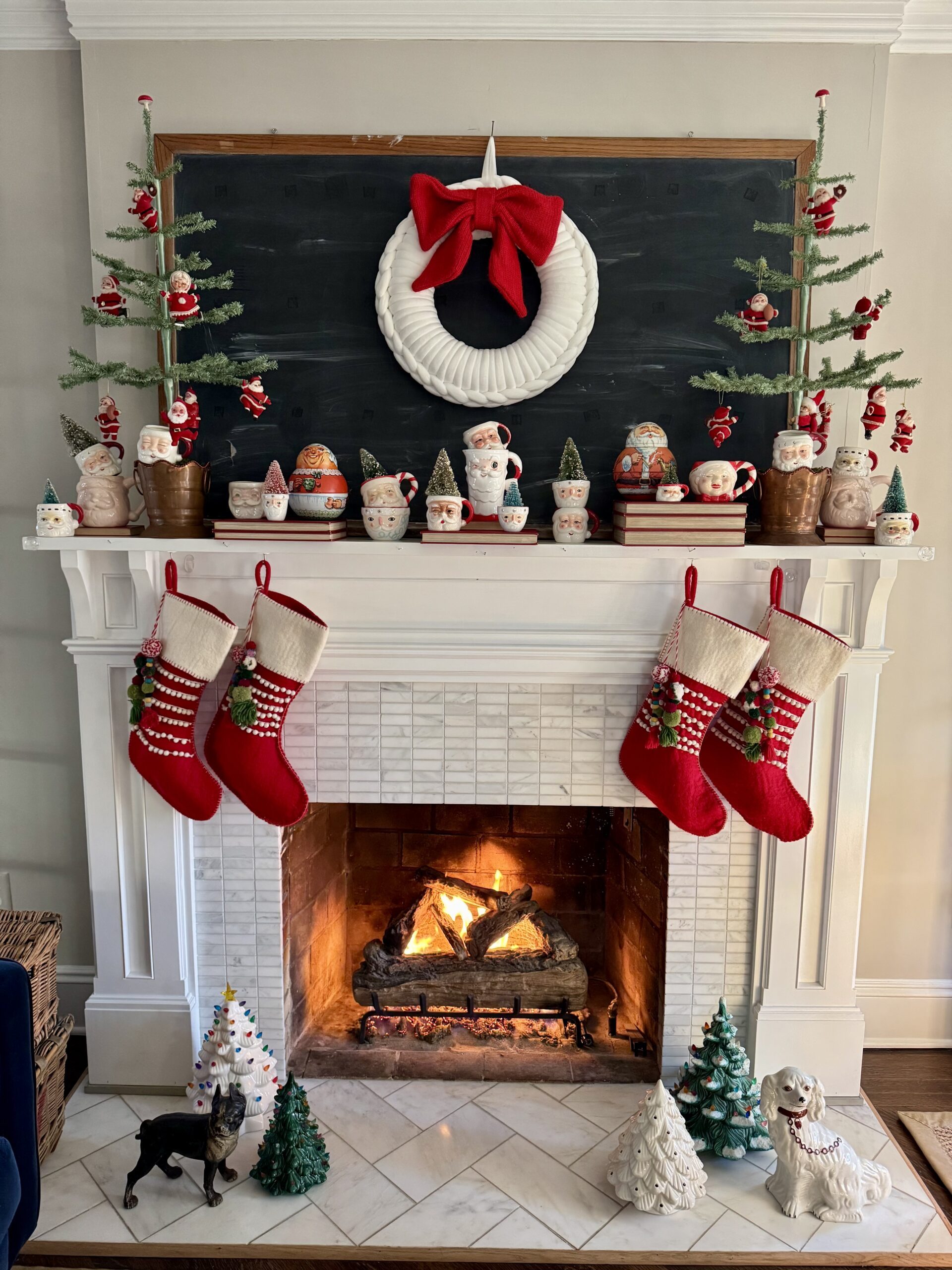 Christmas Mantel with Vintage Santa Figures and Wreath — Vintage Christmas Decor