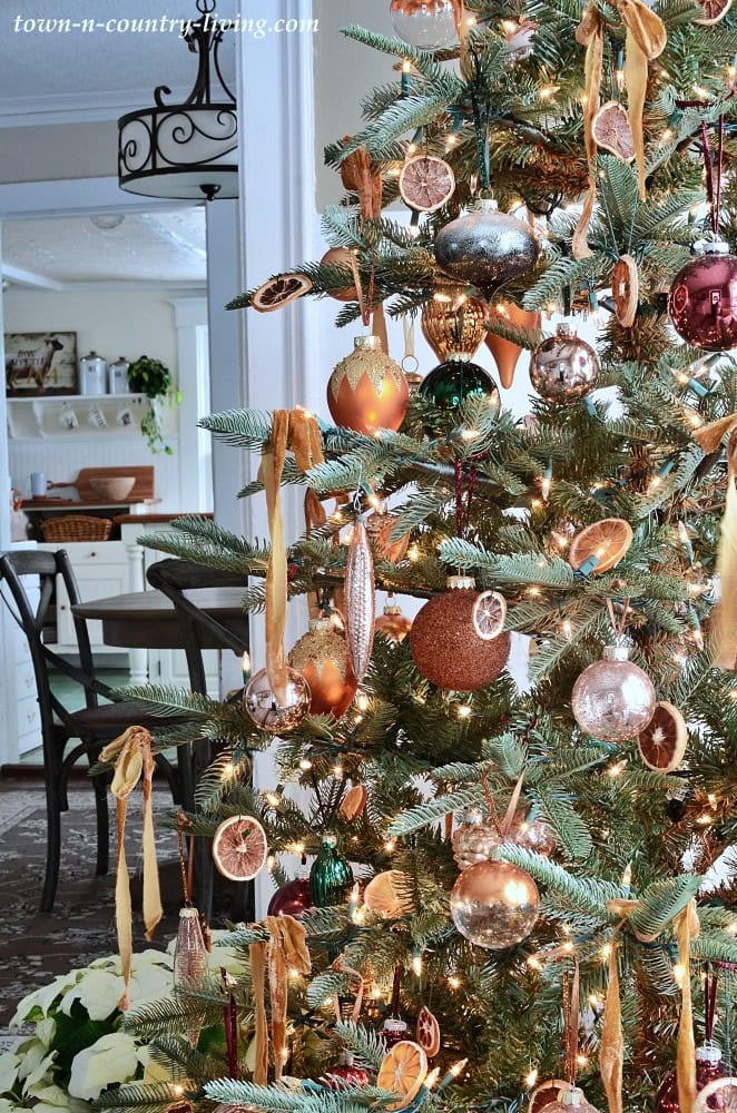 Close-up of Vintage Tree with Dried Oranges and Copper Ornaments — Vintage Christmas Tree