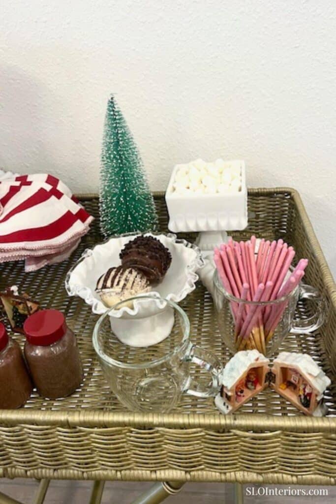 Wicker Bar Cart with Miniature Christmas Tree and Mugs Wicker Bar Cart with Miniature Christmas Tree and Mugs — Christmas Hot Cocoa Bar