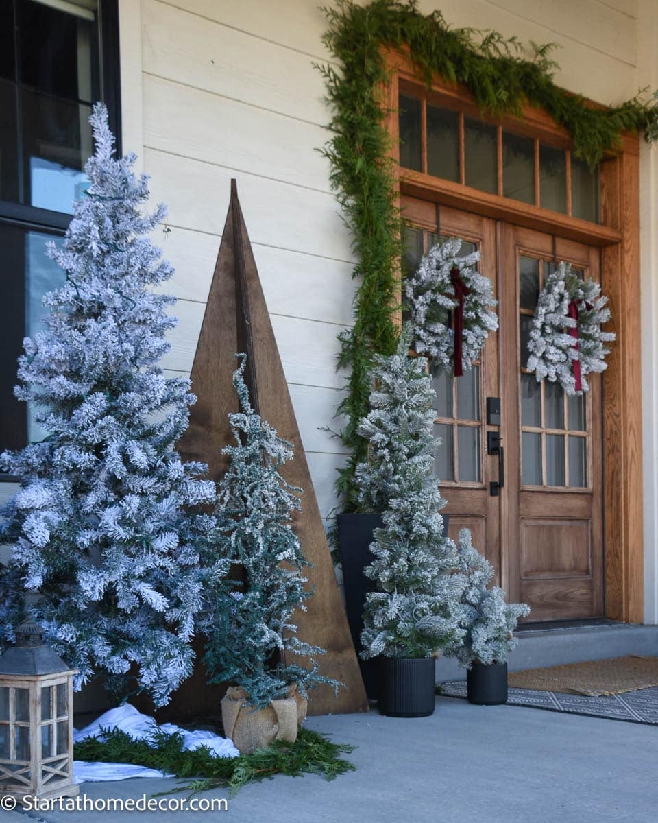 Flocked Trees and Wreaths for a Simple Modern Farmhouse Porch — Simple Christmas Outdoor Decor