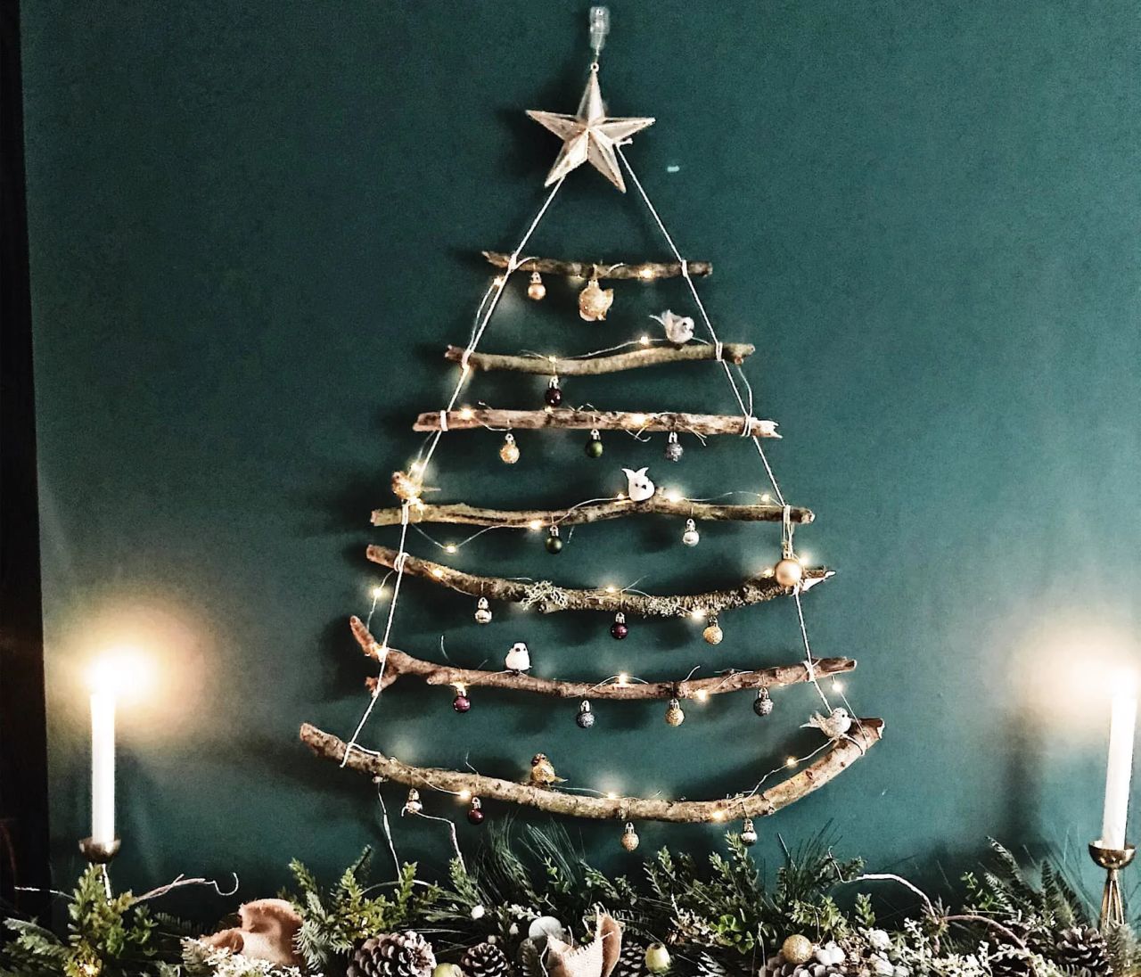 Rustic Driftwood Tree with Delicate Lights on Dark Wall Rustic Driftwood Tree with Delicate Lights on Dark Wall — Wall Christmas Tree