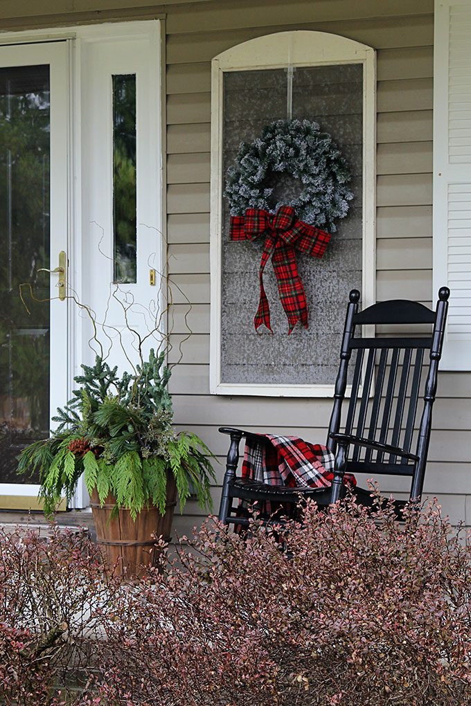 Charming Farmhouse Porch with White Sled and 'Joy to the World' Sign — Farmhouse Christmas Porch