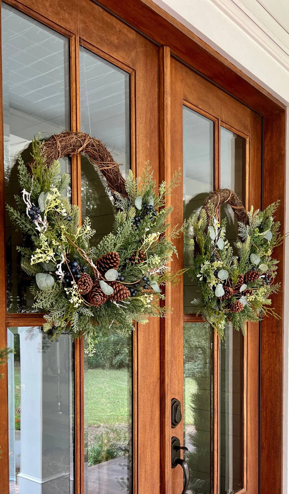 Rustic Grapevine Wreaths on Double Wooden Doors Rustic Grapevine Wreaths on Double Wooden Doors — DIY Christmas Wreath