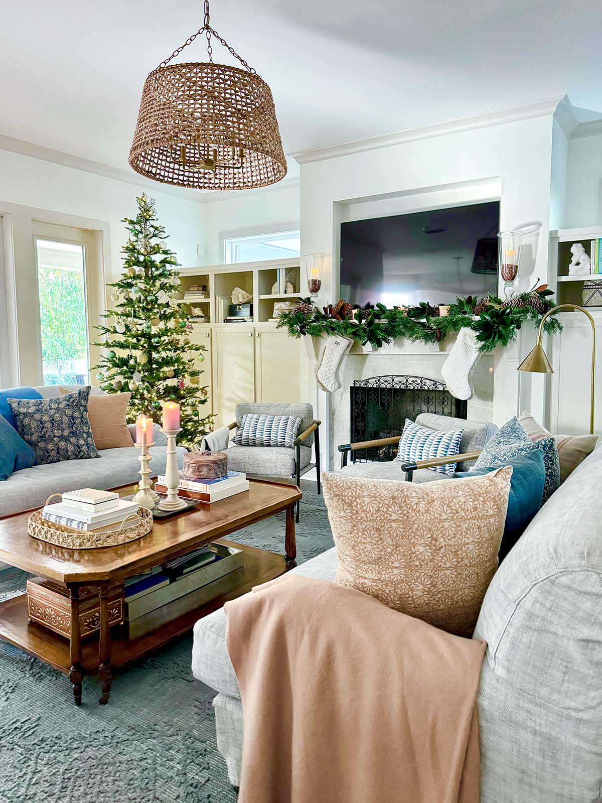 Spacious Living Area Modern Farmhouse Living Room with Garlanded Fireplace and Tree — Cozy Christmas Decor