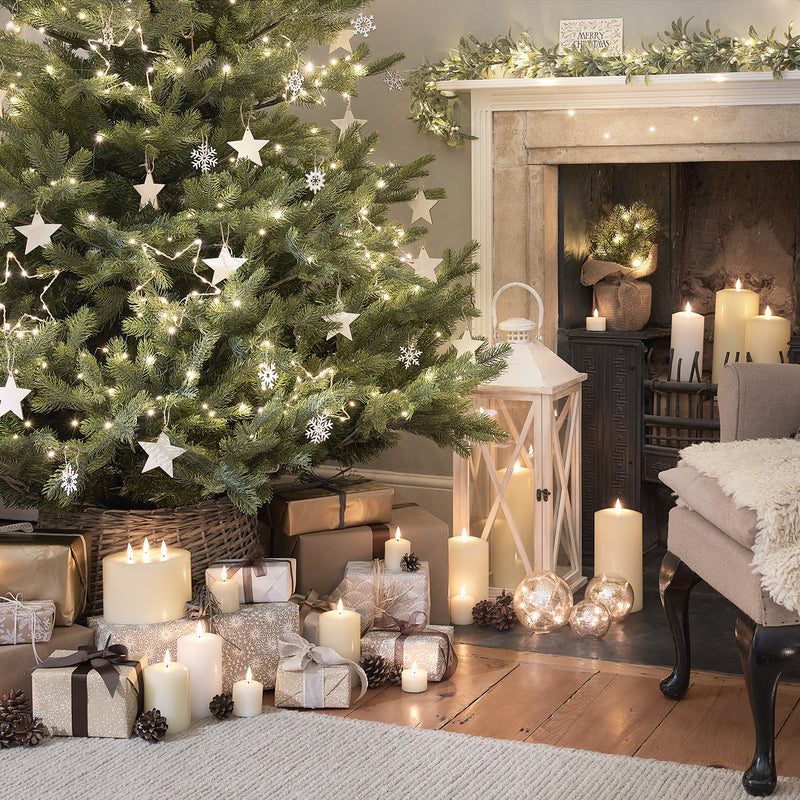 Cozy Living Room Vignette with Abundant Candles and Gifts Cozy Living Room Vignette with Abundant Candles and Gifts — Traditional Christmas Decor