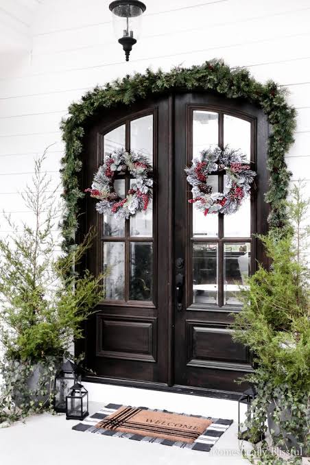 Farmhouse Porch with Frosted Wreaths and Abundant Evergreen Garland — Simple Christmas Outdoor Decor