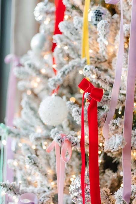 Cascading Pastel Ribbons with a Red Velvet Bow Cascading Pastel Ribbons with a Red Velvet Bow — Christmas Tree Ribbon