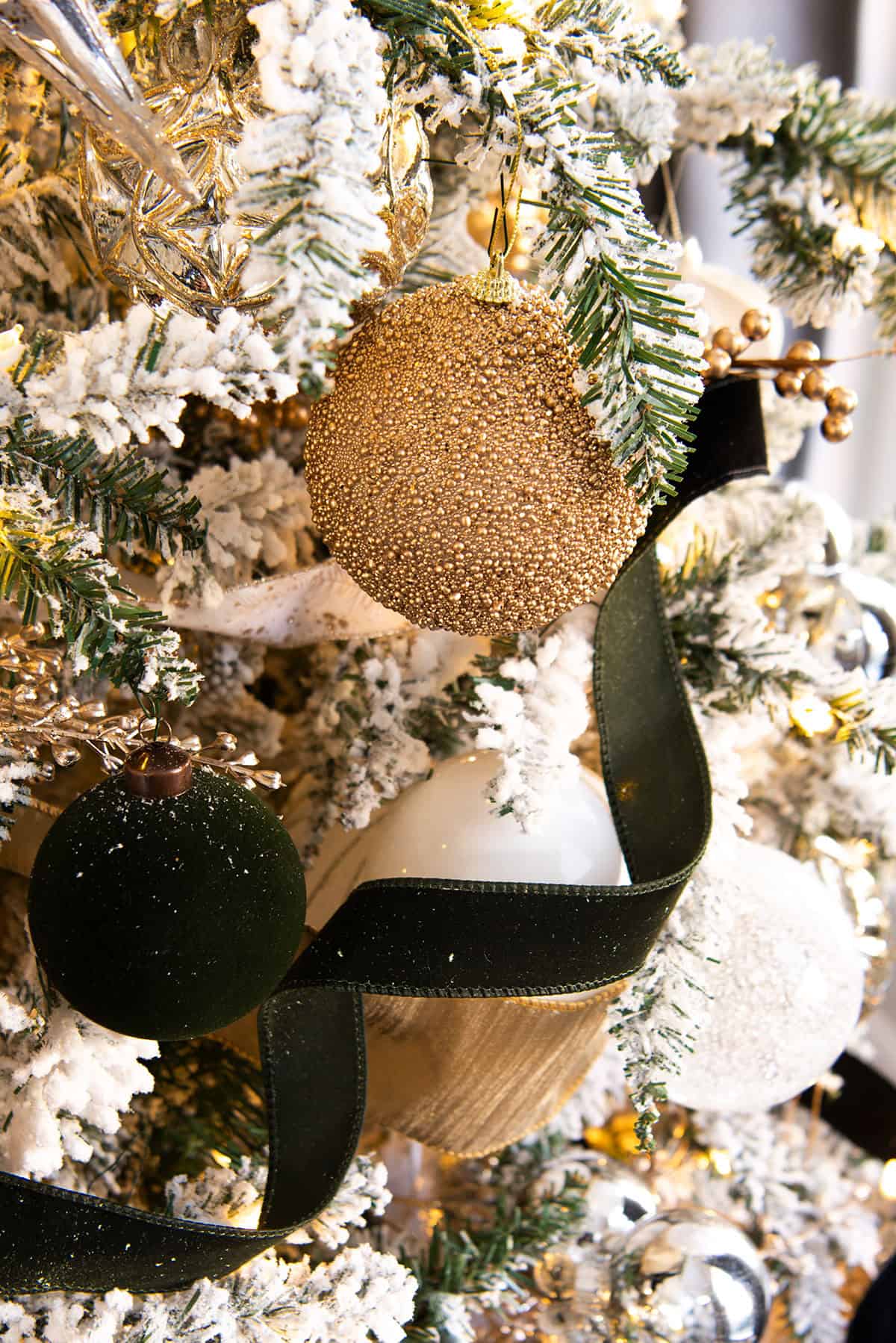Textured Ornaments on a Frosted Christmas Tree Textured Ornaments on a Frosted Christmas Tree — Elegant Christmas Decor