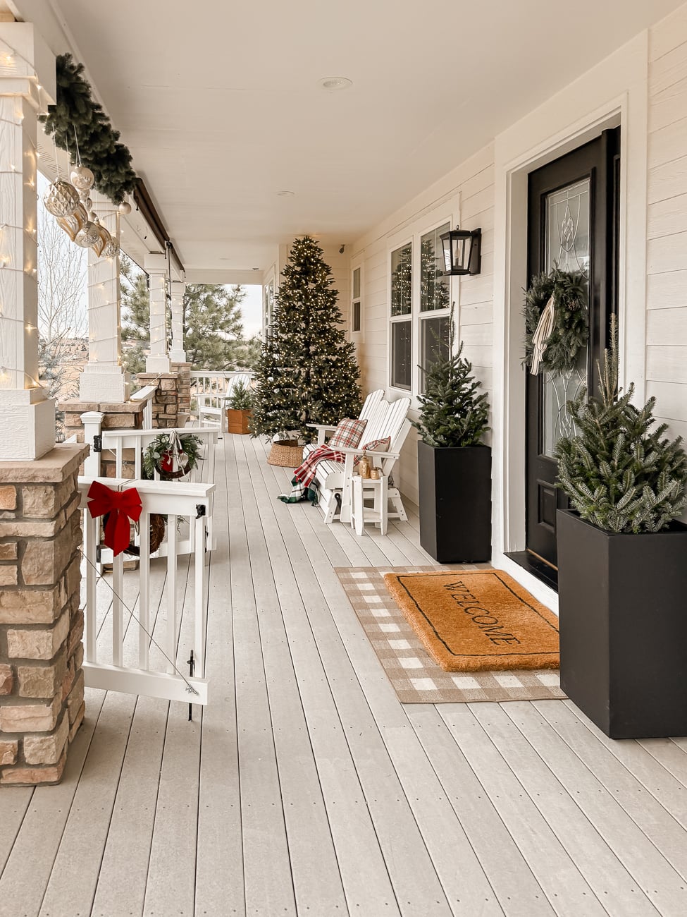 Festive Farmhouse Porch Swing with Garland and Lanterns Festive Farmhouse Porch Swing with Garland and Lanterns — Farmhouse Christmas Decor